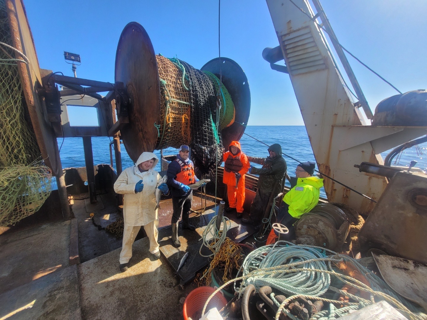 Crew on deck with their first fish.